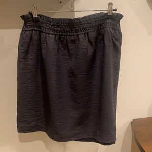 J Crew. Lined dark grey skirt with elastic waist. Excellent condition.